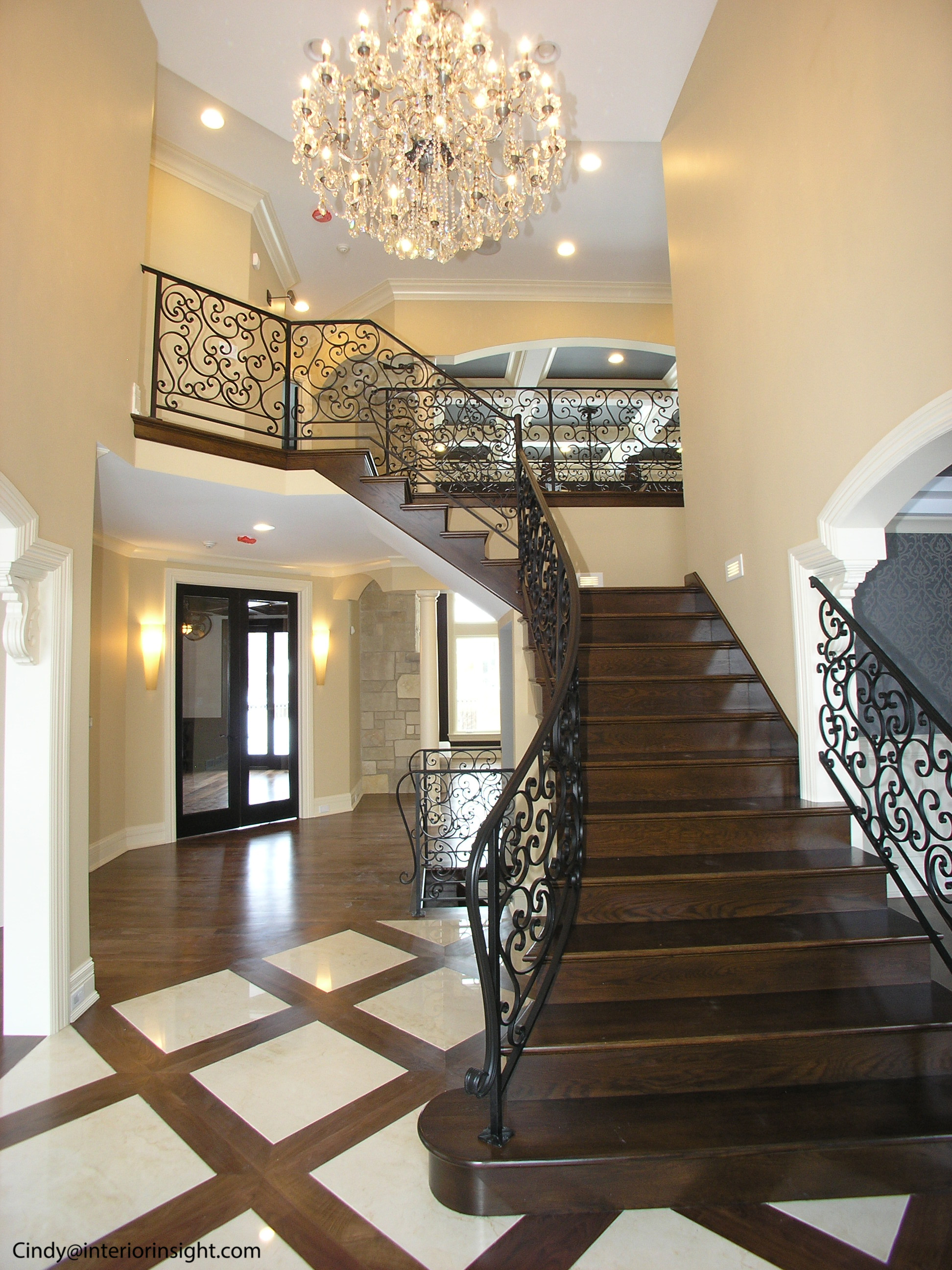 Full Size of Story Foyer With Curved Iron Railings And Wooden Staircse Stunning Chandelier Modern Chords Lower Key Shades Earrings Bridal Lyrics Lighting For Two Light Bulb Changer Charlie Puth Genius Lantern Living Room Ceiling Fan Amazon